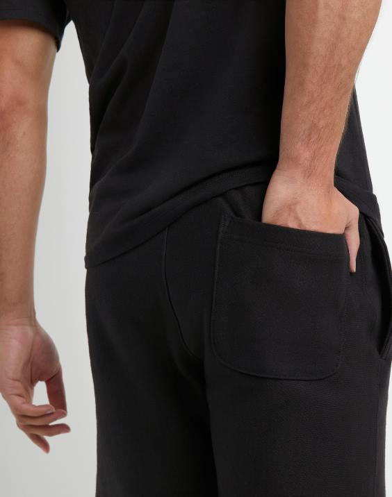 Champion moški kratke hlače z obrnjenim tkanjem 7\" 2B84447 Črna