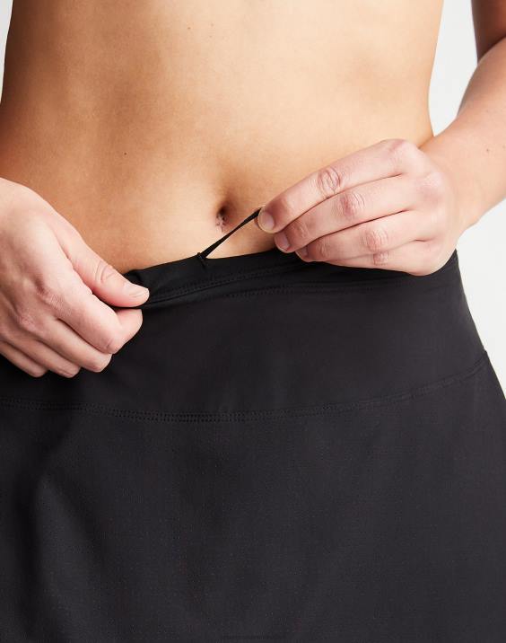 Champion ženske mestno športno krilo z volančki c logotipom 3\" 2B841504 Črna