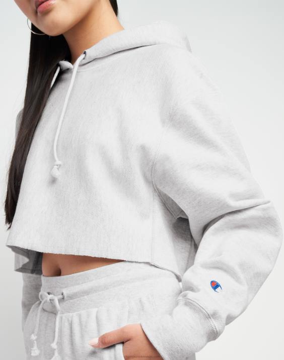 Champion ženske odrezan pulover s kapuco v vzvratnem tkanju z logotipom c 2B841043 srebrno siva